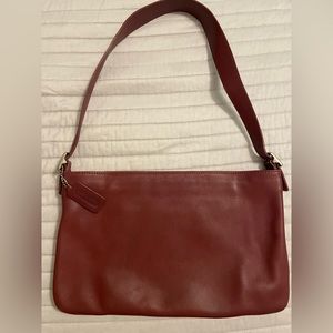 Coach wine colored leather purse